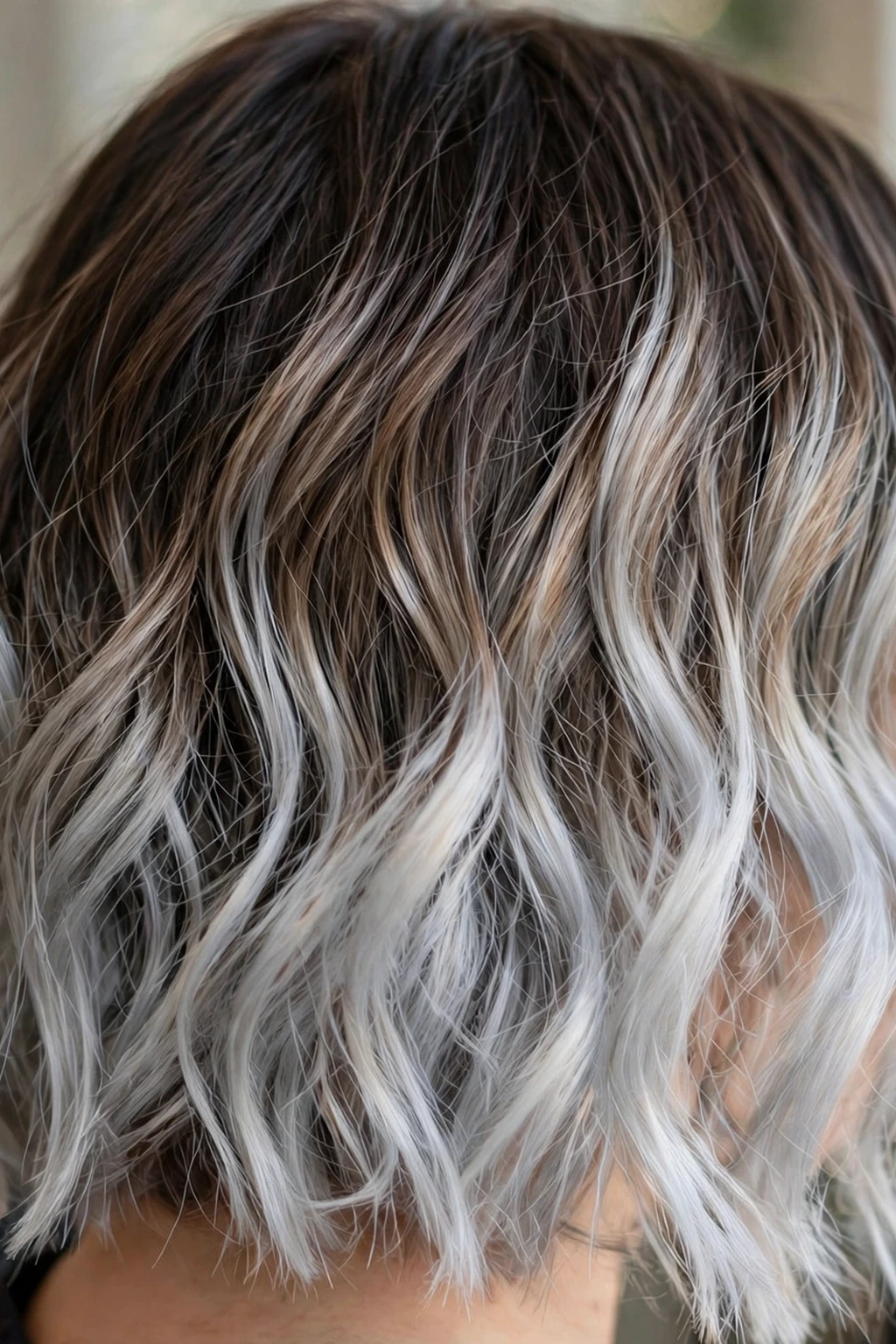 Silver Highlights: 15 Stunning Ideas to Try 3 1. Silver Balayage Ombre on Medium Waves